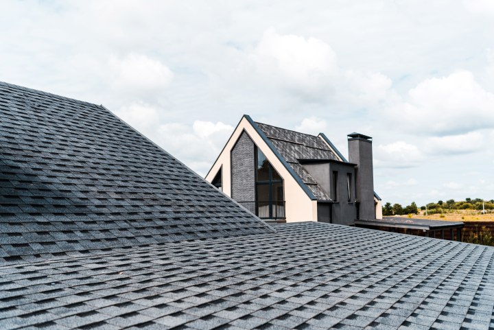 Close up of residential home with new asphalt roof